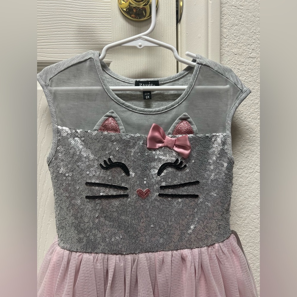 Zunie Sleeveless Kitty Mesh Tutu
Dress size 6X